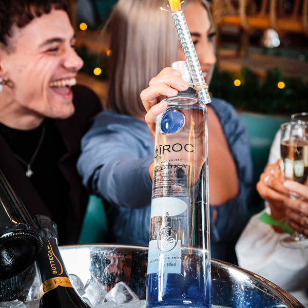 BOTTLE OF HOUSE SPIRIT AND COCKTAIL PITCHER